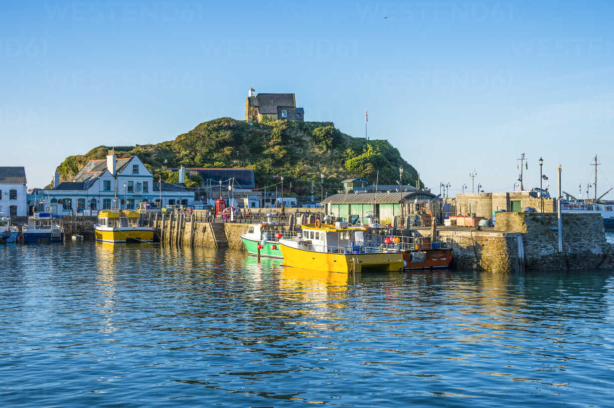 Ilfracombe Harbour with boats departing for Lundy Island in summer