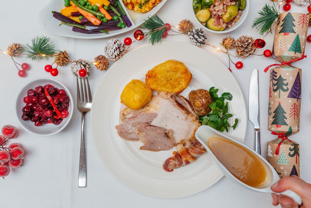 A family enjoy New Years Eve together in a hotel