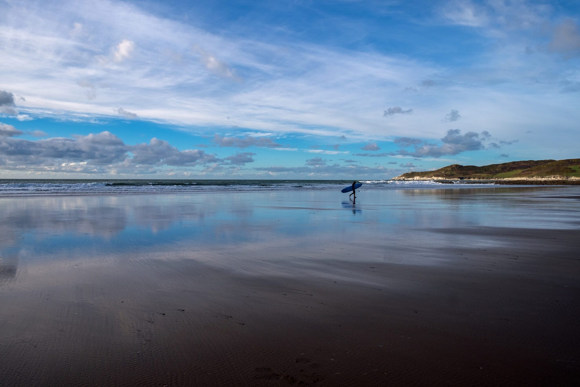Woolacombe,Surfer Golden sands at Woolacombe Beach, a short drive from The Carlton Ilfracombe