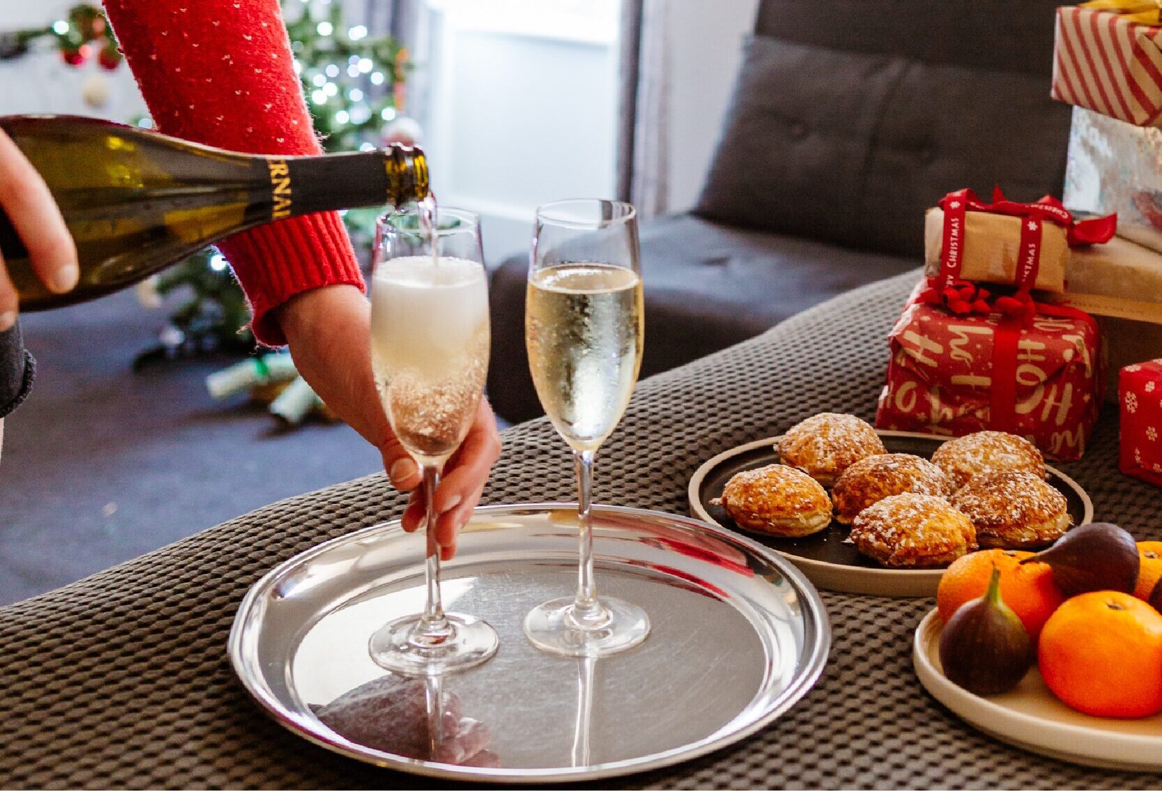 Bedroom with fizz 2025 Pouring champagne into a glass at a Christmas Work Party in North Devon