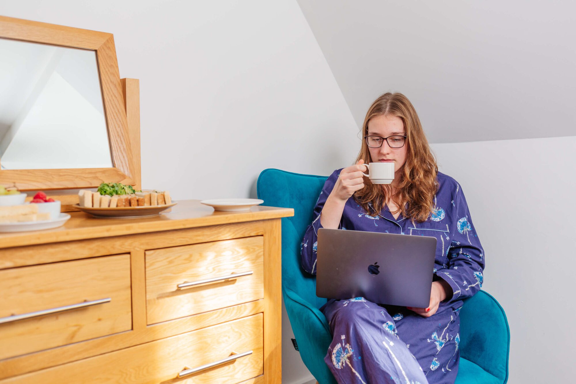 Woman working in a hotel room at The Carlton, a business hotel in North Devon